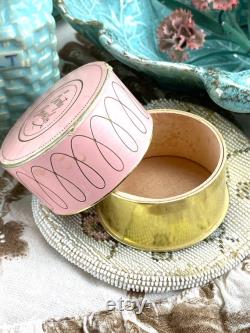 Vintage pink cardboard powder compact