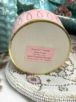 Vintage pink cardboard powder compact