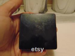 Vintage pre owned small metal powder compact with enameled flowers made by Marathon