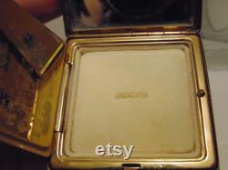 Vintage pre owned small metal powder compact with enameled flowers made by Marathon